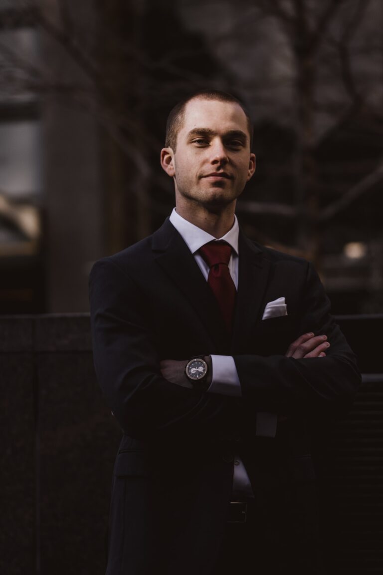 Busines man in suit, shirt and tie dressing for success.