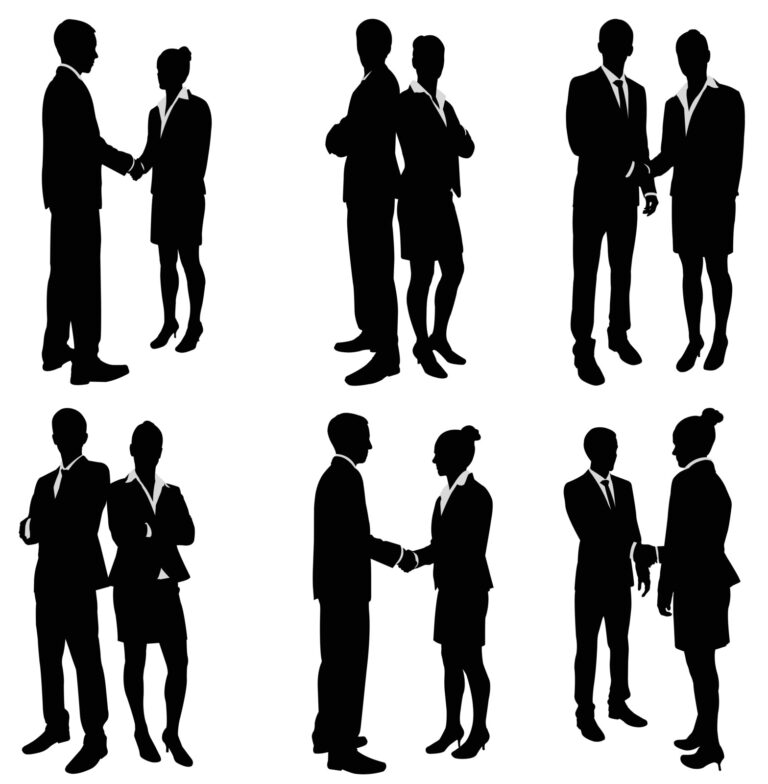 Silhouettes of business people shaking hands having negotiated something