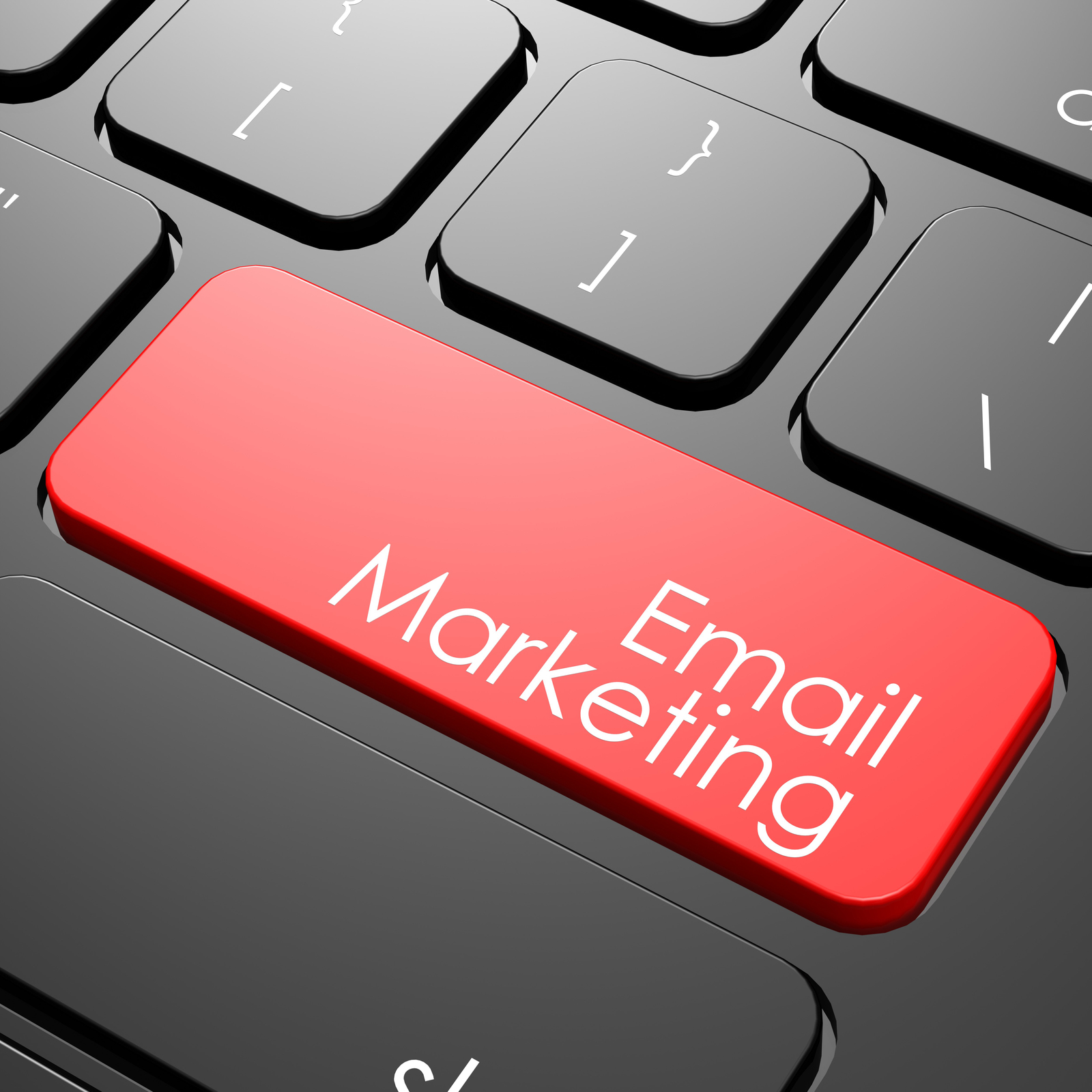 Keyboard with a red key with the words email marketing