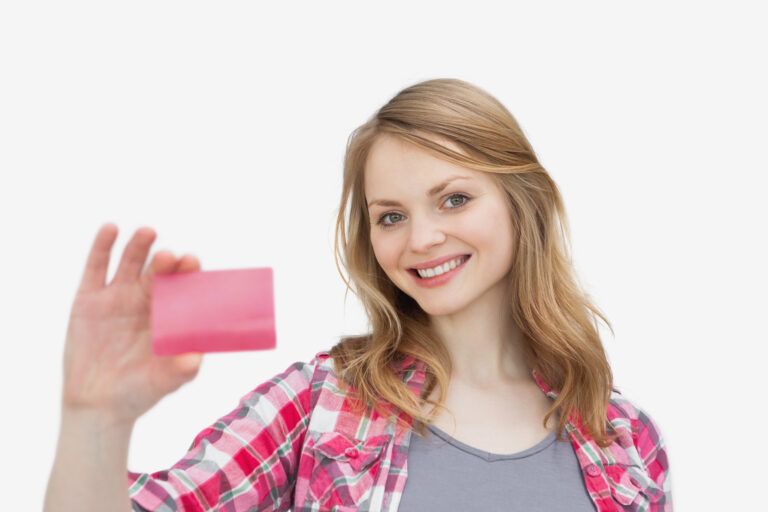 Woman holding a loyalty card.