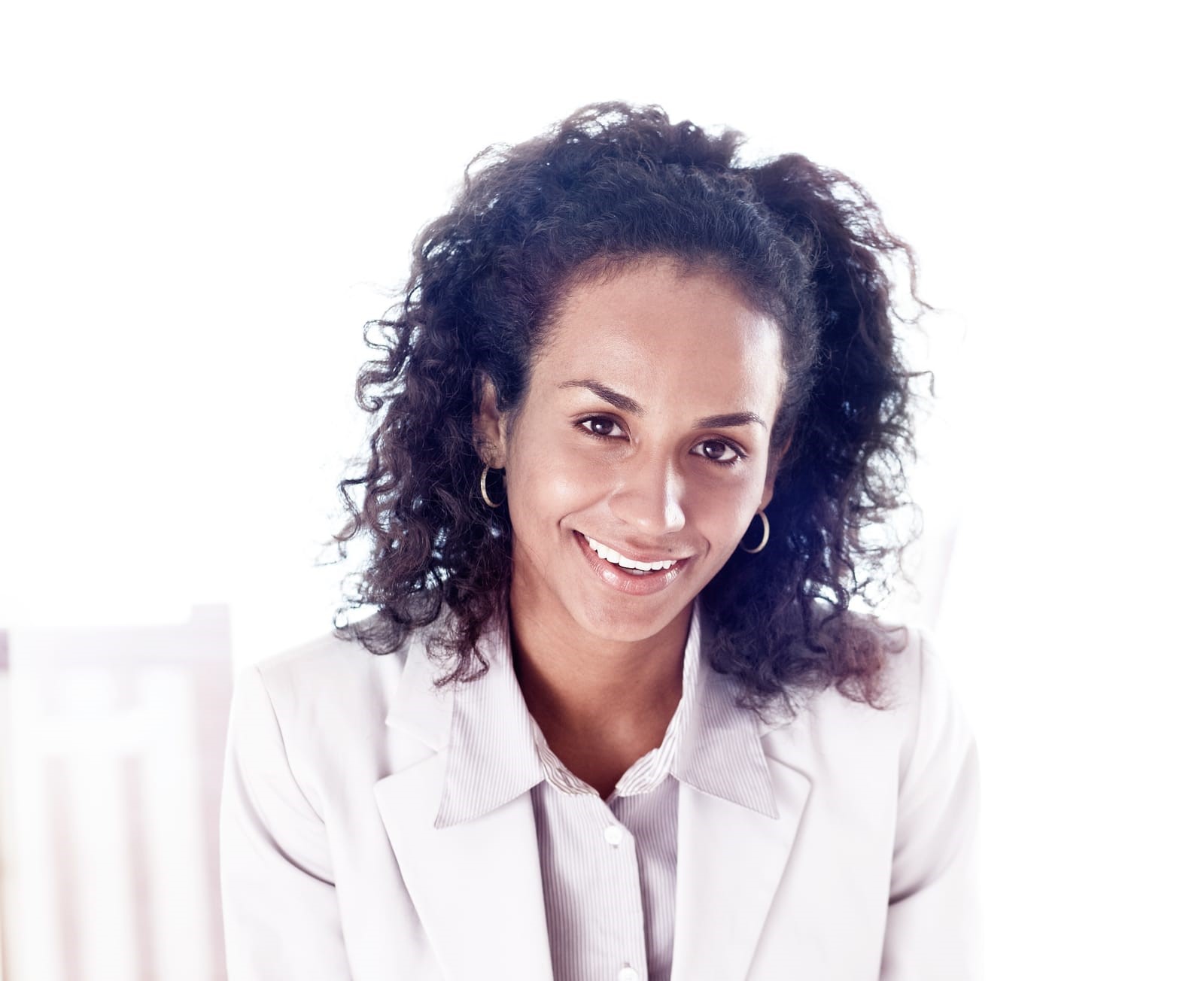 Shes got the business smarts to succeed. A young business woman isolated on white background.