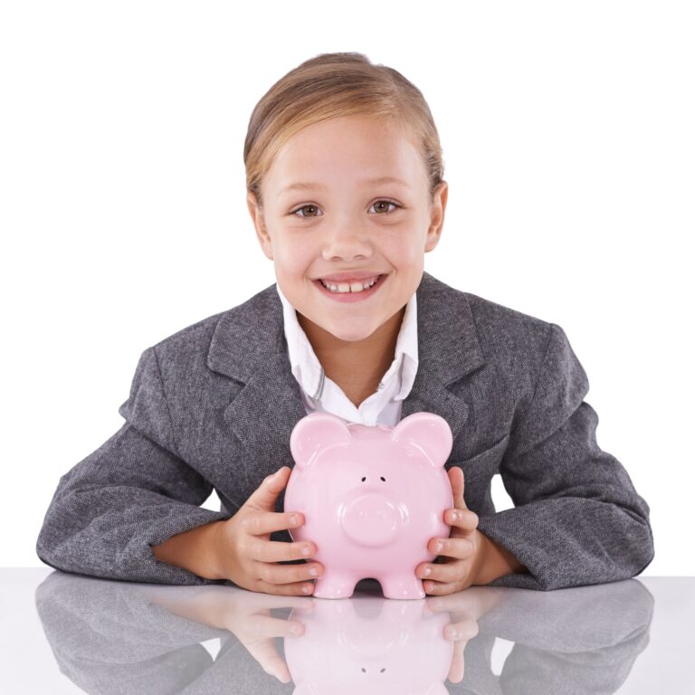 Young girl holding a piggy bank, considering investment options for the future.