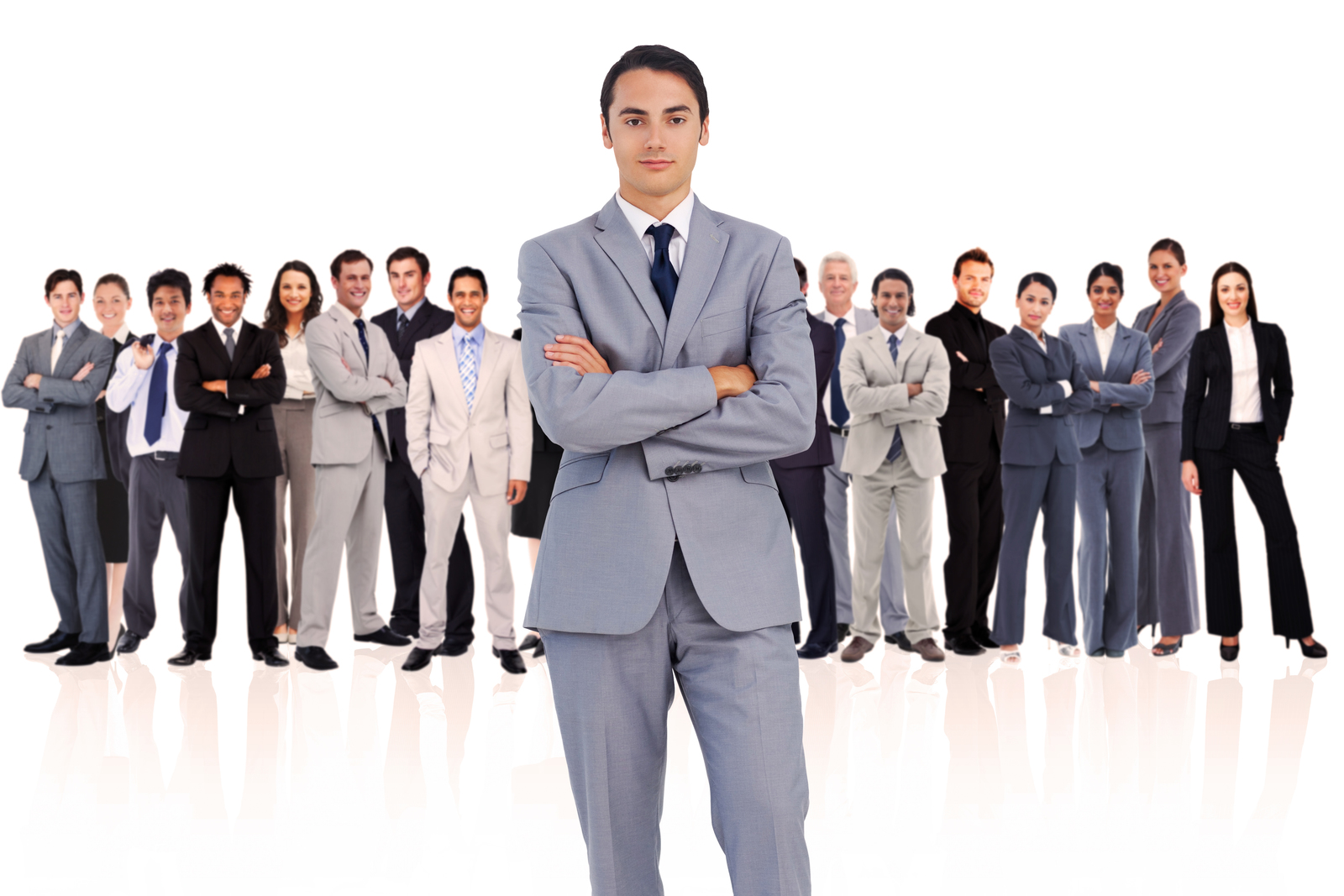 A business man standing out from the crowd to illustrate his uniqueness in the market.